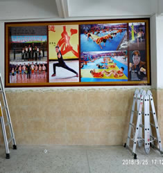 玉林市印顺广告安装新圩育才武术散打俱乐部写真贴墙