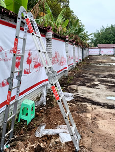 玉林市印顺广告定制安装玉林师范学院喷绘布广告围墙